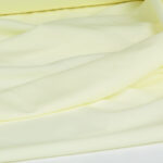 پارچه لباسی پلی استر ویسکوز عرض 150 بروجرد ساده رنگ لیمویی 1190