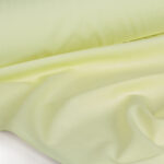 پارچه لباسی پلی استر ویسکوز عرض 150 بروجرد ساده رنگ ليمويي