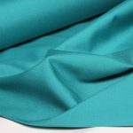 پارچه مانتو شلواری پلی استر ویسکوز بروجرد عرض 150 طرح ساده رنگ سبز بنتون کد 1420