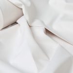 پارچه ملحفه ای 100% پنبه بروجرد عرض 250 ساده رنگ کرم روشن